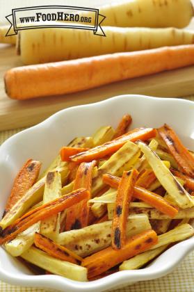 Bowl of golden, tender carrot and parsnip sticks.