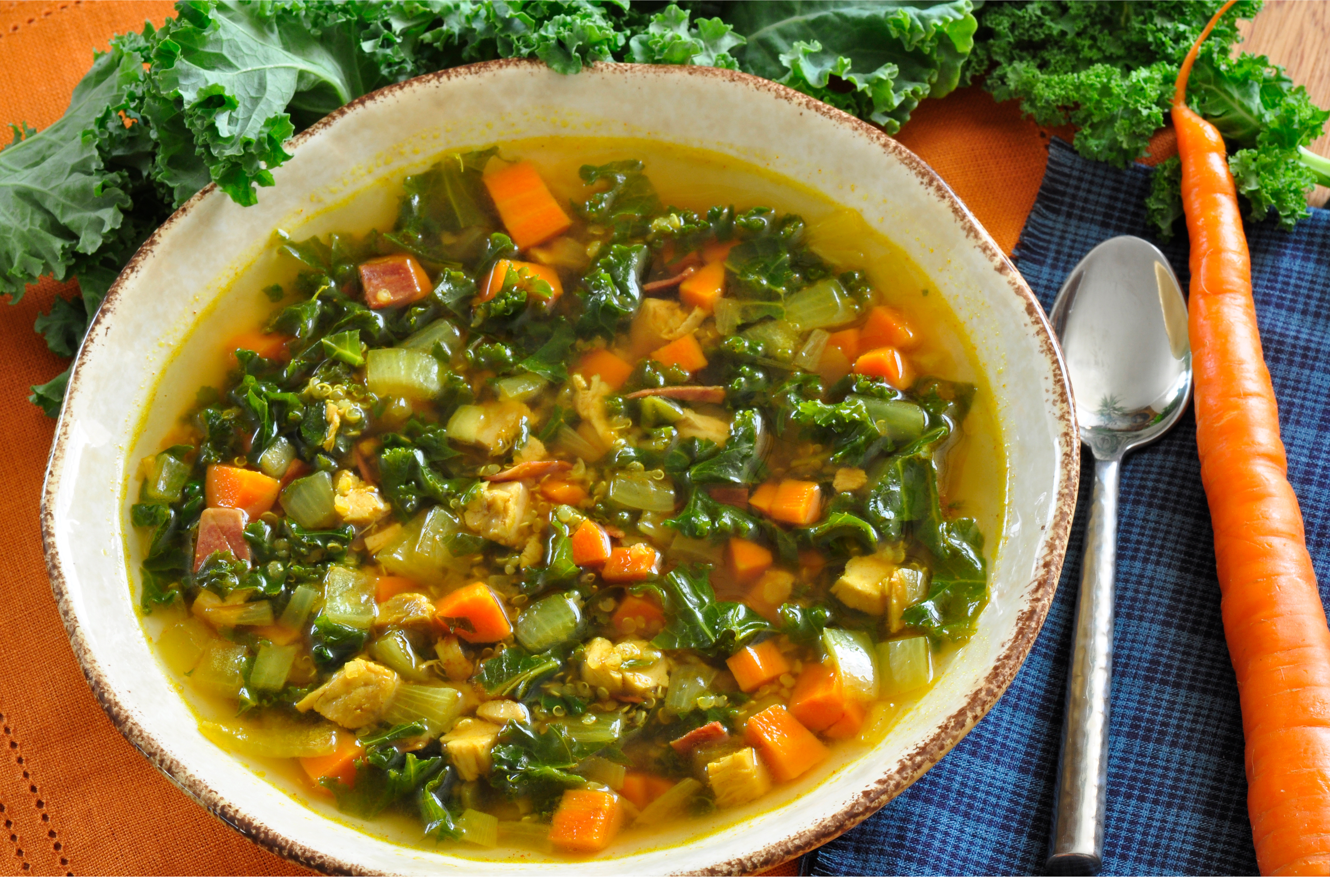 Chicken and Greens Soup served on tabletop 