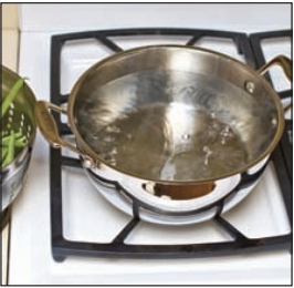Pot with boiling water.