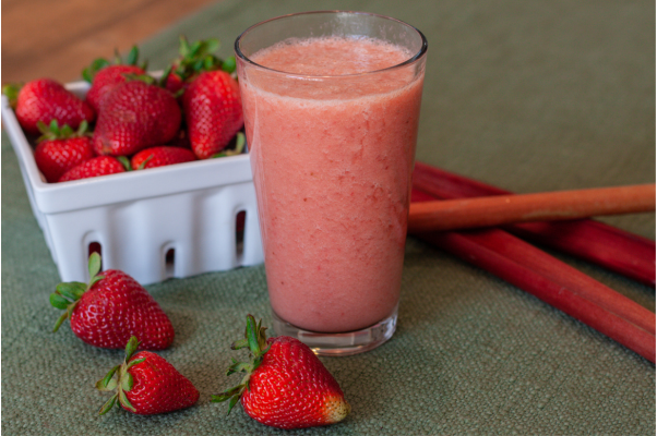 strawberry rhubarb smoothie on table