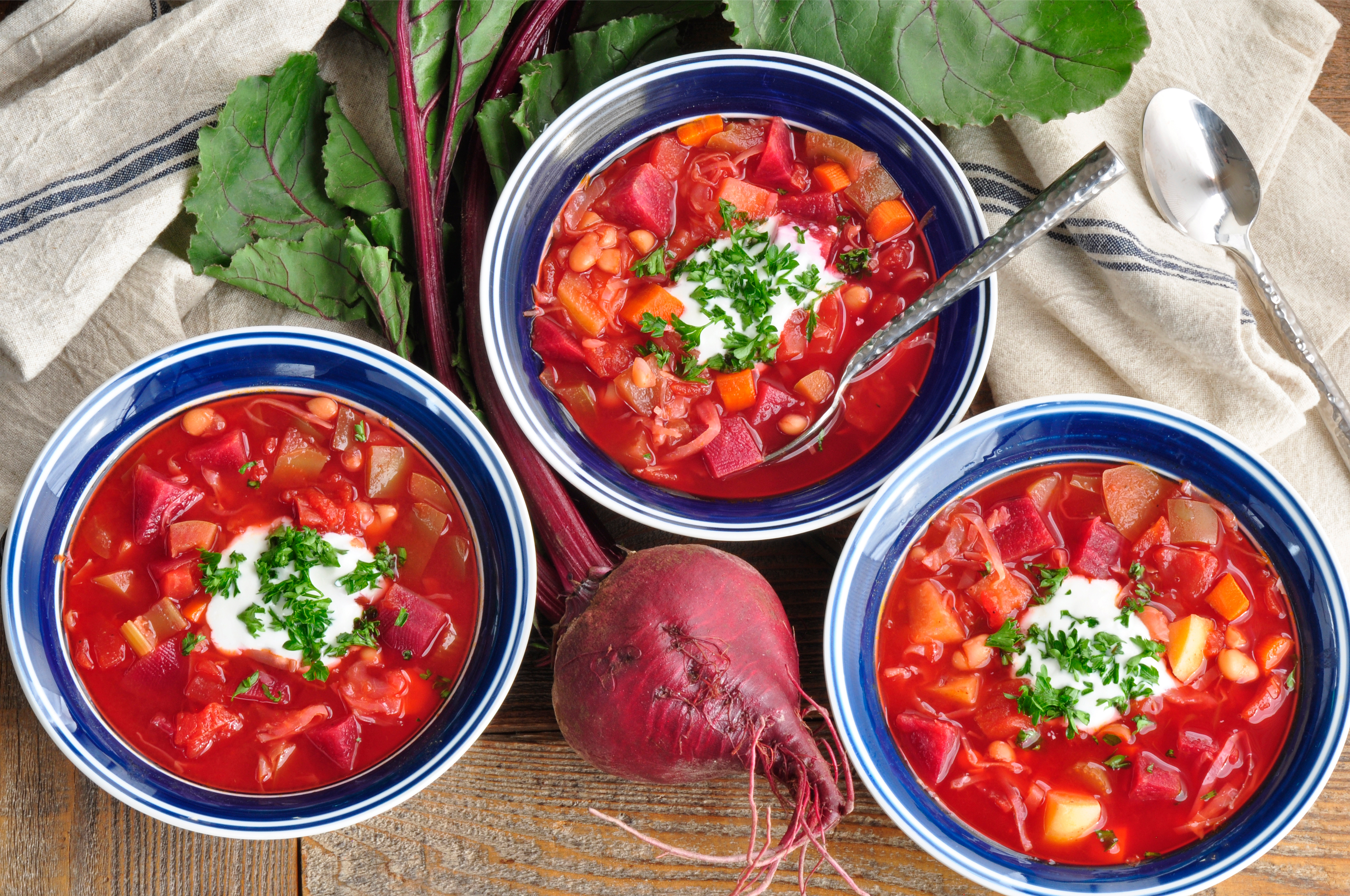 Vegetarian Borscht Dish served in bowls on wood table