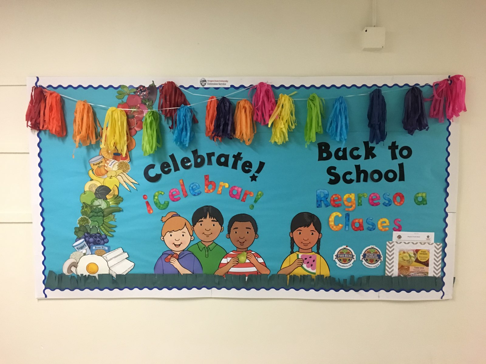 School Bulletin Board in English and Spanish with text, celebrate back to school