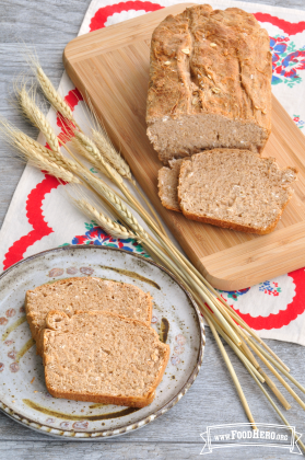 Slices of whole-wheat and oat bread.