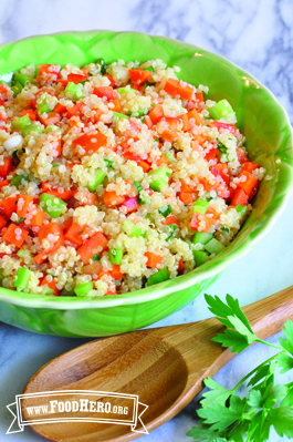 Bowl of quinoa with a colorful vegetable mix.