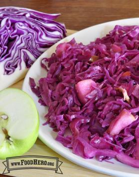 Plate of sauteed cabbage and apples.