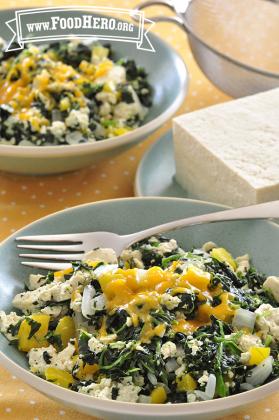 Bowls of tofu and spinach with melted cheese.