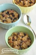 Dishes of whole-grain bread pudding with raisins.
