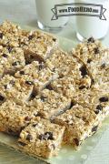 Platter of oat and peanut butter squares with raisins.