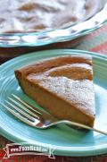 Moist slice of pumpkin pie.