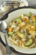 Rice, chicken, vegetable and cheese dish.