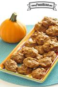 Large platter of orange pumpkin cookies. 