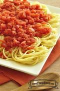 Tomato sauce served over spaghetti noodles.