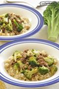 Shallow bowls of rice are topped with a flavorful mix of ground beef and broccoli.