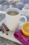 Mug of steaming hot cider drink. 