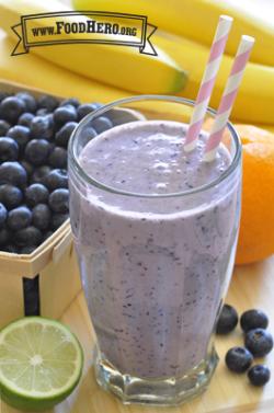 Tofu blended with a mix of fruits makes a creamy smoothie in a glass.