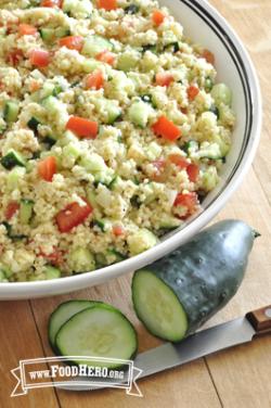 Fluffy couscous mixed with chopped vegetables.