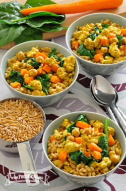 Bowls of kamut with a tofu and vegetable topping.