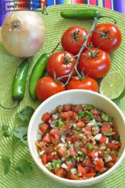 Small bowl of diced tomato-based salsa.