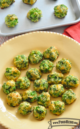 Scoops of seasoned and baked broccoli and cheese mixture are displayed on serving platter .