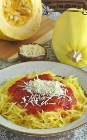 Spaghetti squash strands served with red sauce and grated parmesan cheese.