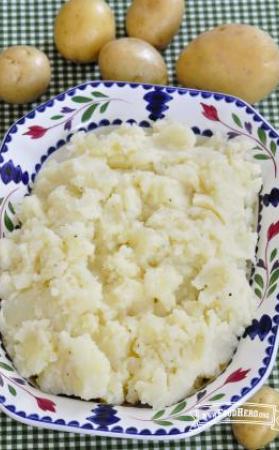 Platter of seasoned and mashed potatoes.