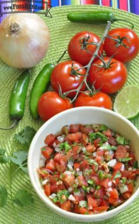 Small bowl of diced tomato-based salsa.
