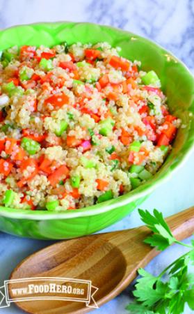 Bowl of quinoa with a colorful vegetable mix.