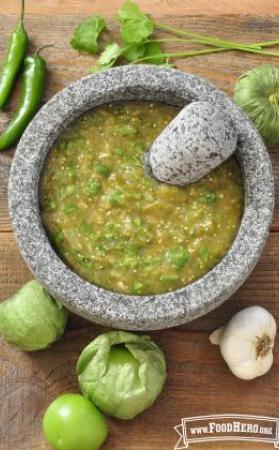 Bowl of green textured salsa. 