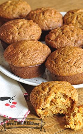 Pulled-apart fluffy and moist sweet potato muffins.