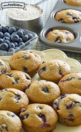 Plate of fluffy blueberry muffins.