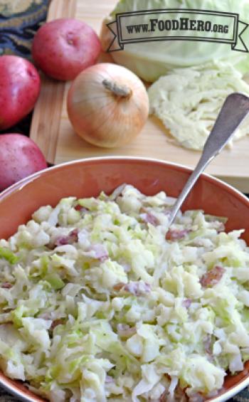 Medium bowl of creamy potato and cabbage mix.