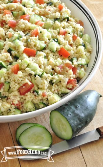 Fluffy couscous mixed with chopped vegetables.