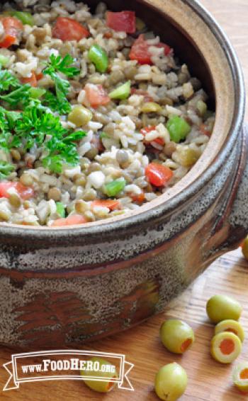 Rice, lentil and vegetable dish garnished with parsley