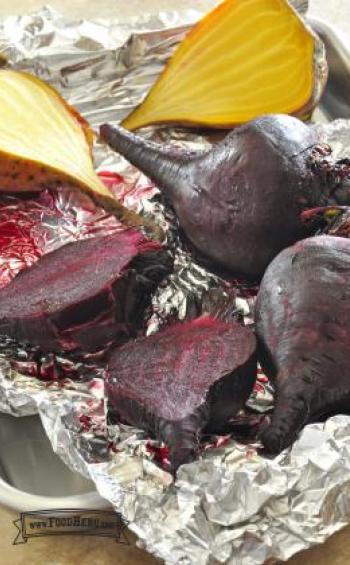 Baking sheet with golden and red beets.
