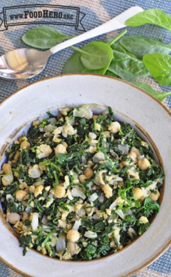 Bowl of bright green salad with beans.