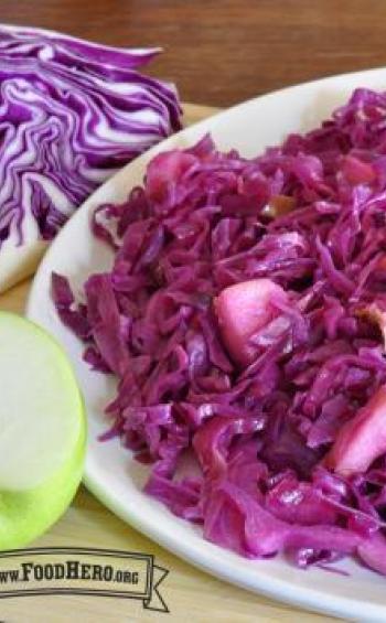 Plate of sauteed cabbage and apples.