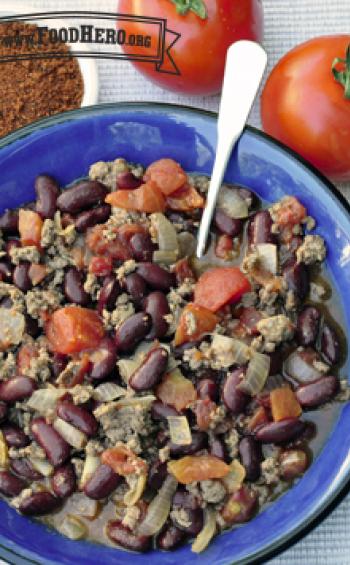 Small bowl of chili with beans, ground meat and vegetables.