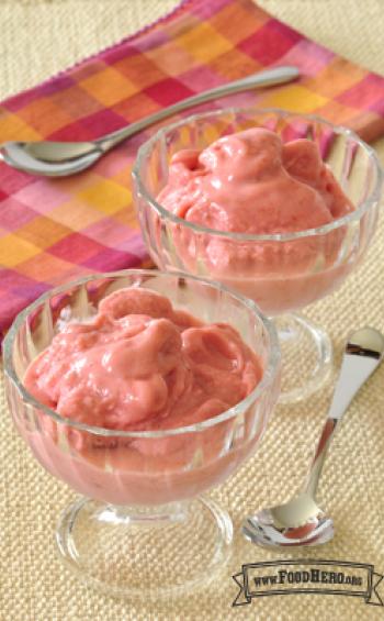 Footed dessert glasses with a creamy pink blend.