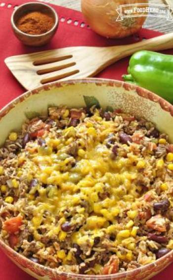 Large bowl of Hamburger Skillet with a melty cheese topping.
