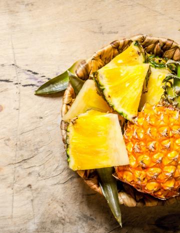 Cut Pineapple on Wood