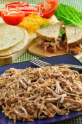Plate of tender shredded pork.